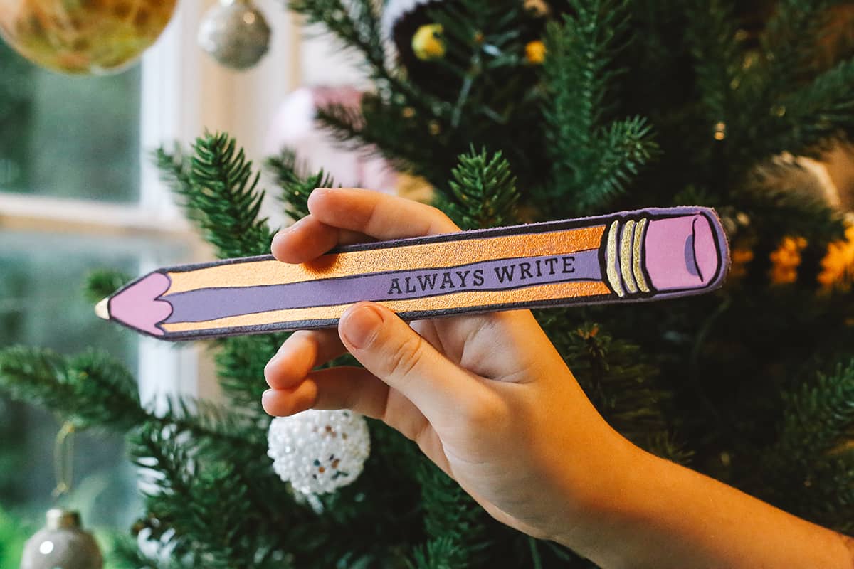 Àine & Co. Ark Bookmark in Always Write, featuring gold, purple and pink pencil design and text "Always Write"