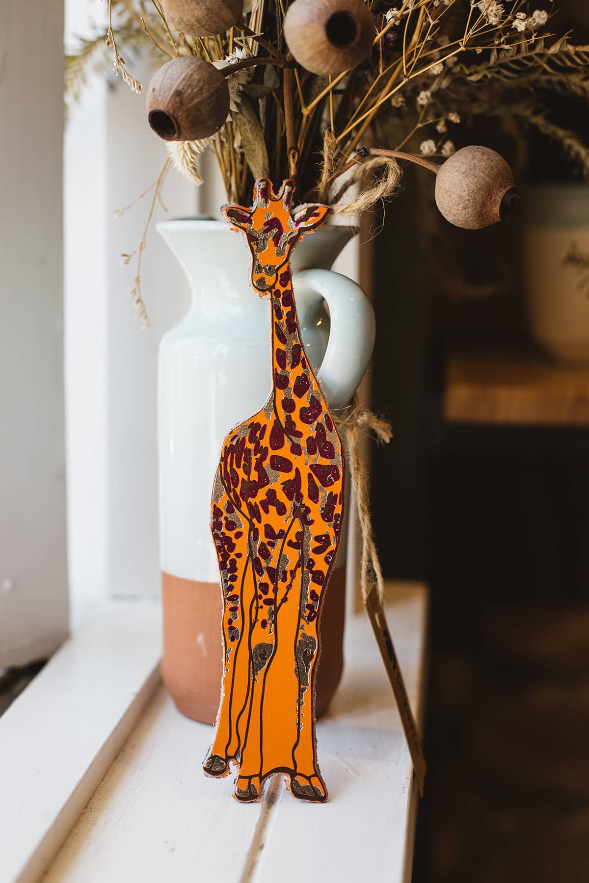 Àine & Co. Ark Bookmark in Giraffe, featuring orange and brown giraffe design