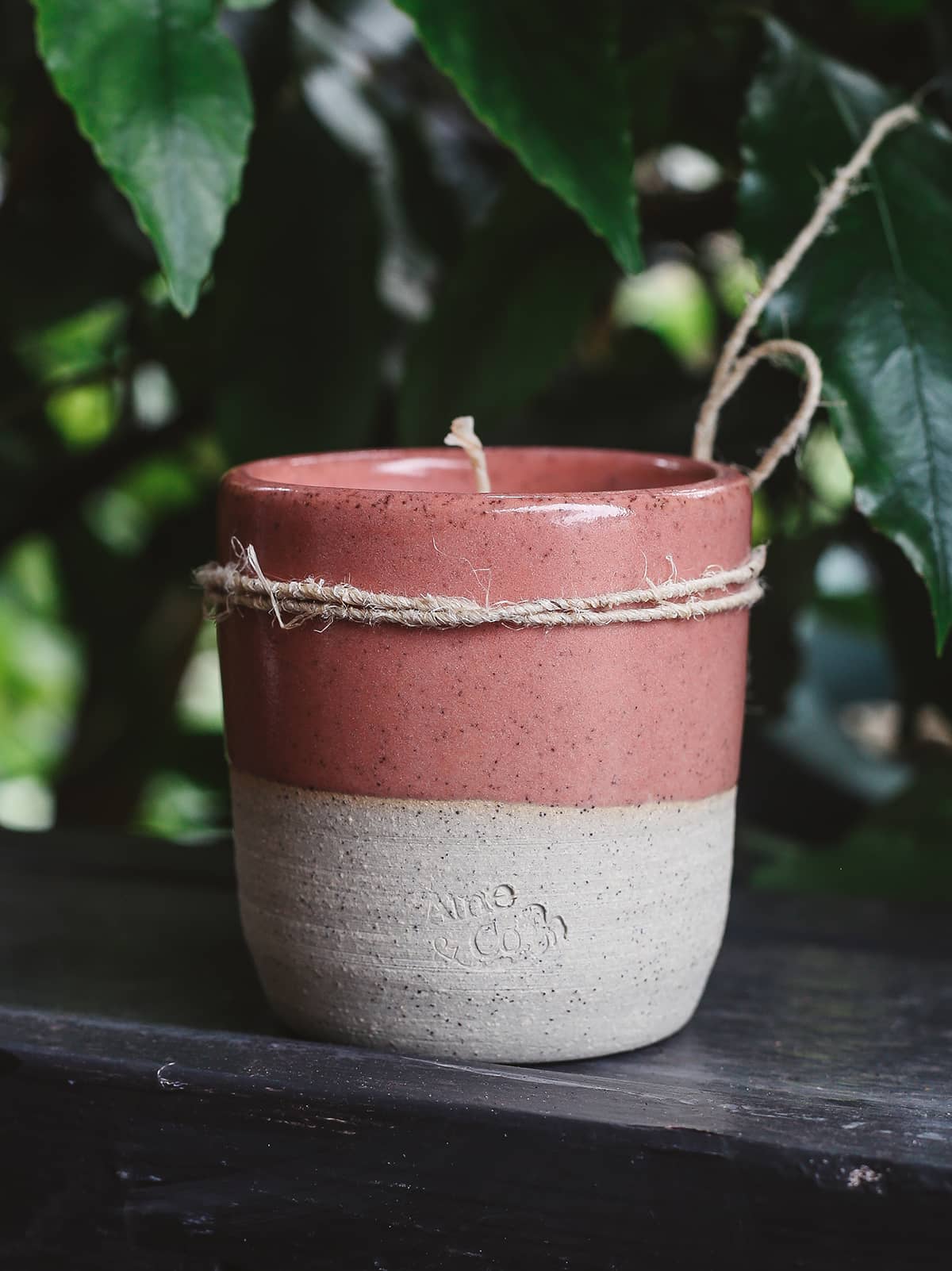 Àine & Co. Ceramic Tumbler Candle in deep pink, featuring cylindrical ceramic cup with natural speckled white on the bottom half and deep pink glaze on the top half