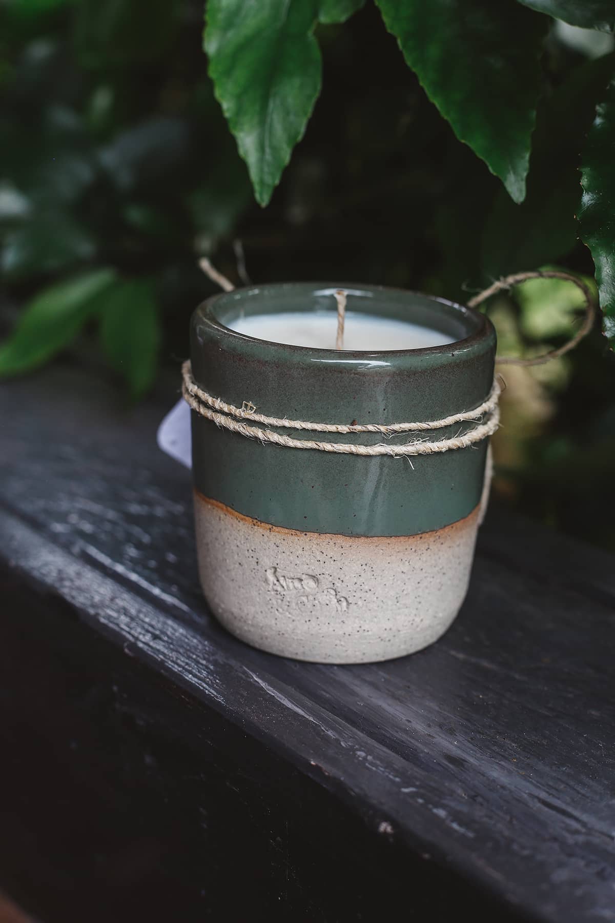 Àine & Co. Ceramic Tumbler Candle in green, featuring cylindrical ceramic cup with natural speckled white on the bottom half and green glaze on the top half