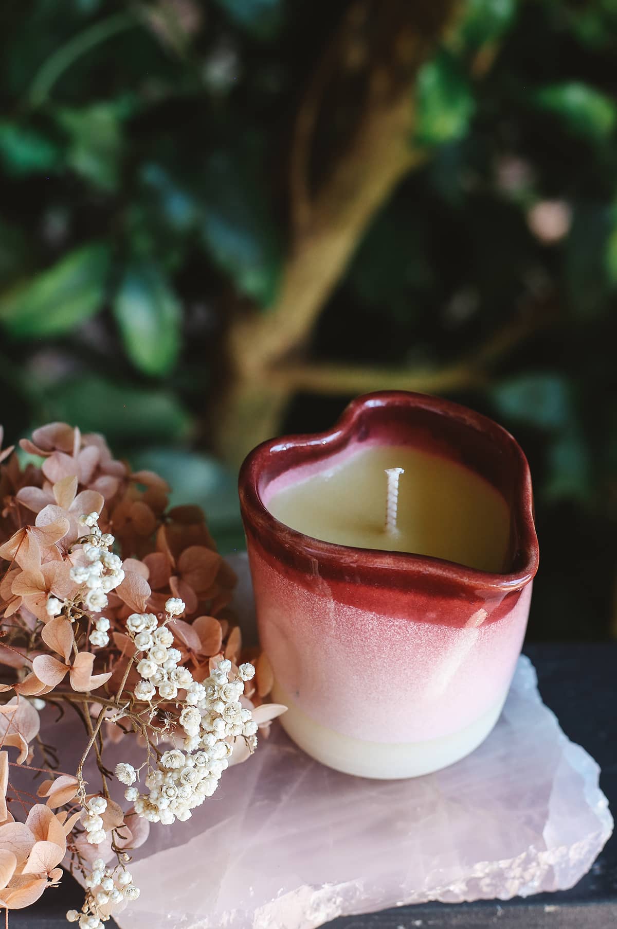 Àine & Co. Heart of Lupercalia Candle Jug featuring heart shaped ceramic jug with red and pink glaze