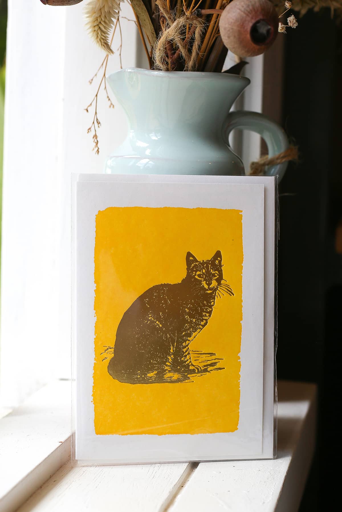Àine & Co. Archivist greeting card featuring cat on yellow background