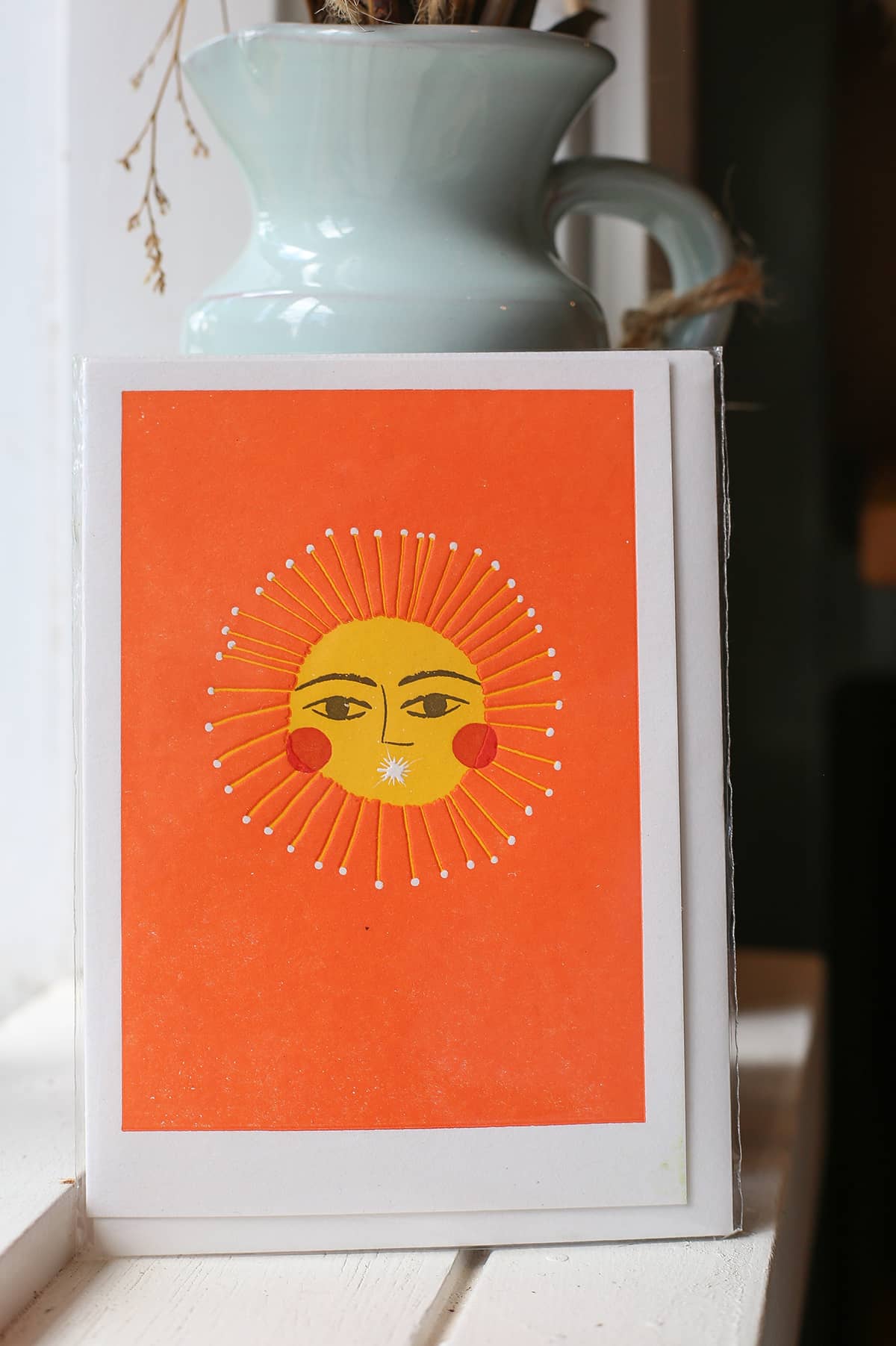 Àine & Co. Archivist greeting card featuring illustrated dandelion with yellow face in centre