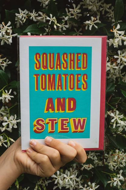 Àine & Co. Archivist greeting card featuring bold red text "Squashed tomatoes and stew" on turquoise background