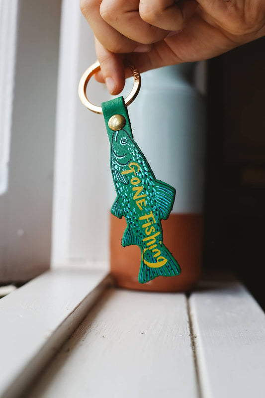 Àine & Co. Ark Colour Design Keyring in "Gone Fishing", featuring leather with illustrated green fish design and gold hardware