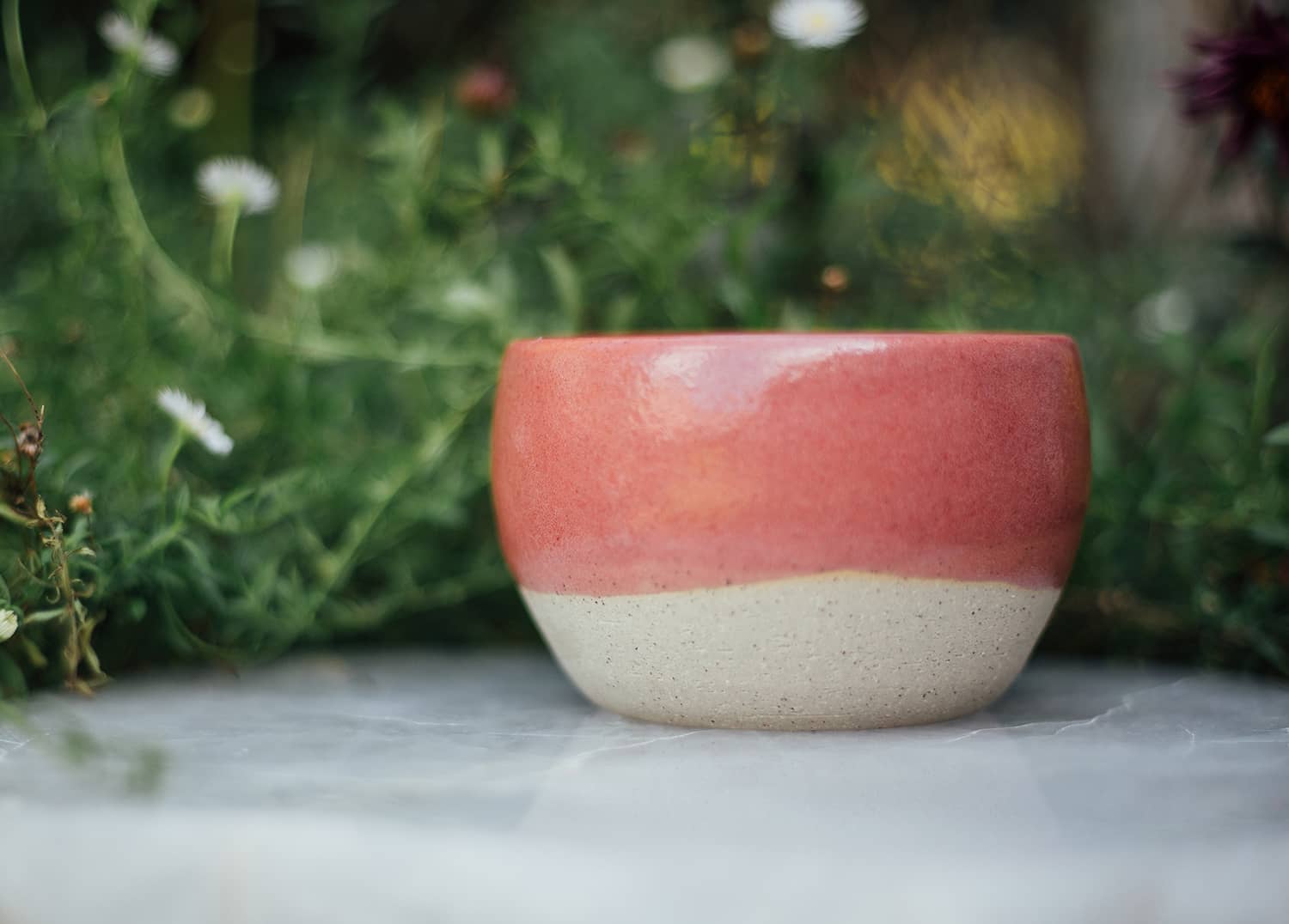 Àine & Co. Comfort Candle Cup in Bácáil (Fire). A reusable ceramic candle cup featuring a deep pink colour.