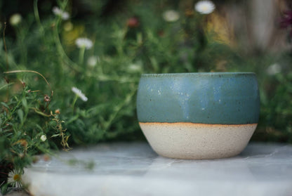 Àine & Co. Comfort Cup in Murúch (Mermaid). A reusable ceramic candle cup featuring a light teal colour.