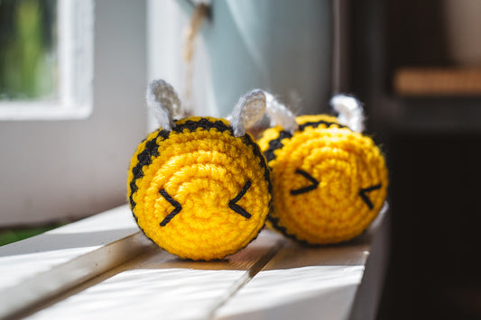 Àine & Co. Crochet Baby Toy in "Bee", featuring yellow bee design