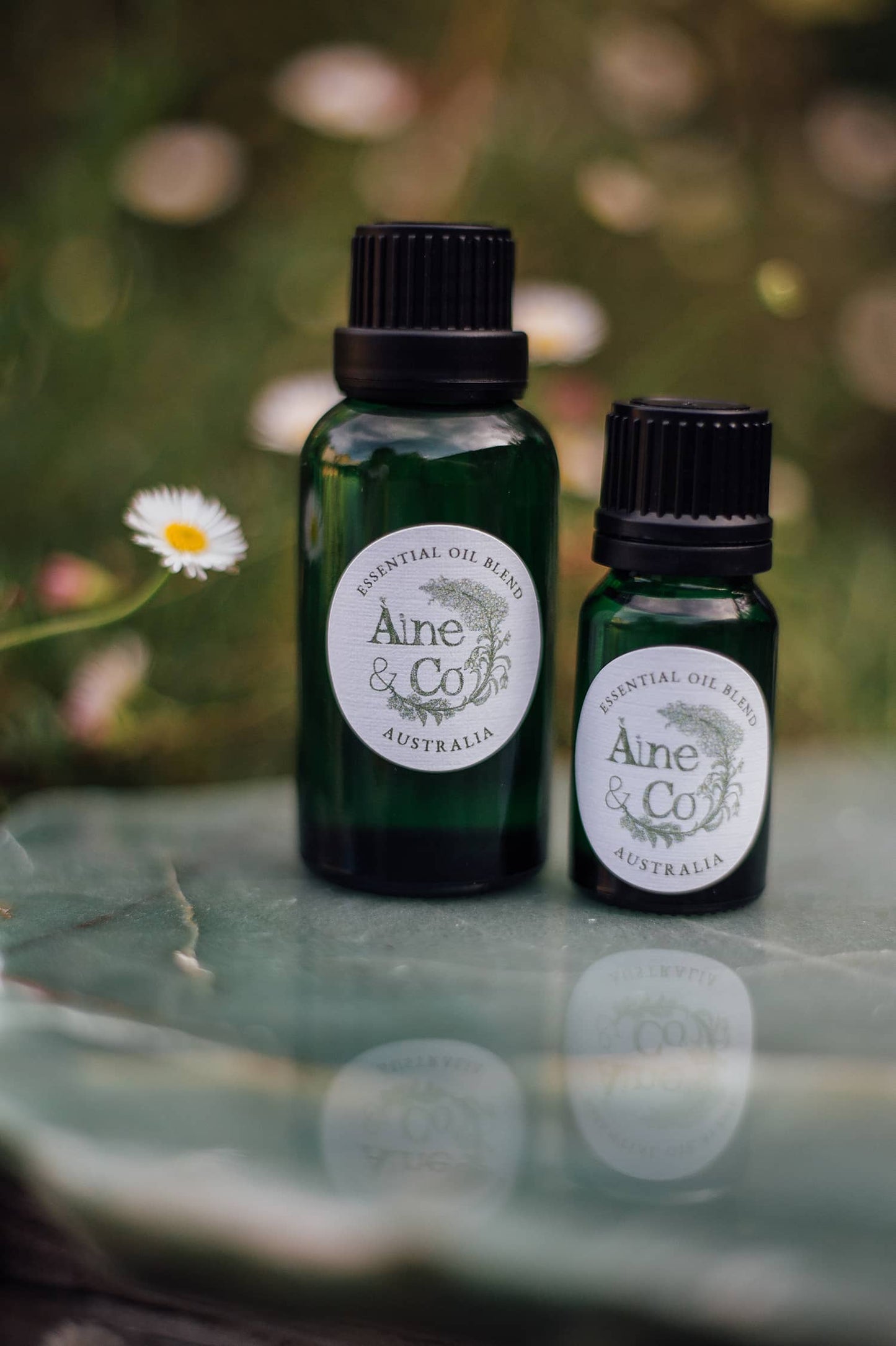 Àine & Co. Essential Oil Blend in the scent Australia. 10ml and 30ml bottles next to each other for comparison