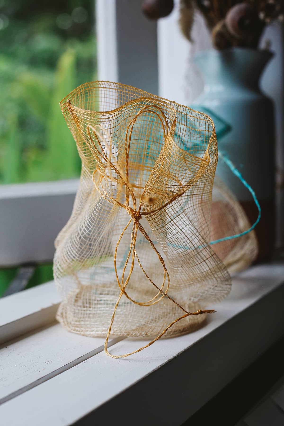 Àine & Co. yellow Sinamay mesh gift bag