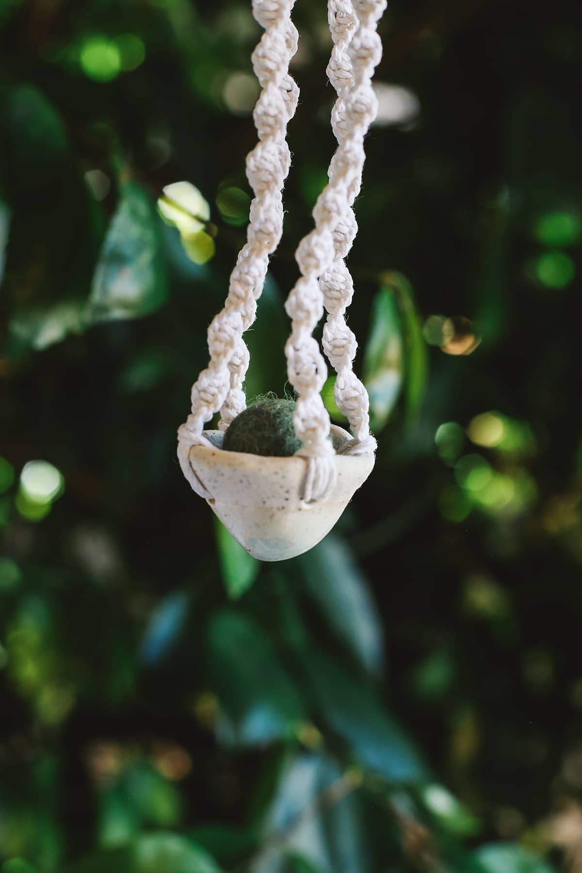 Àine & Co. Handmade Ceramic Car Diffusers in mountain style featuring woven string and essential oil felt ball inside