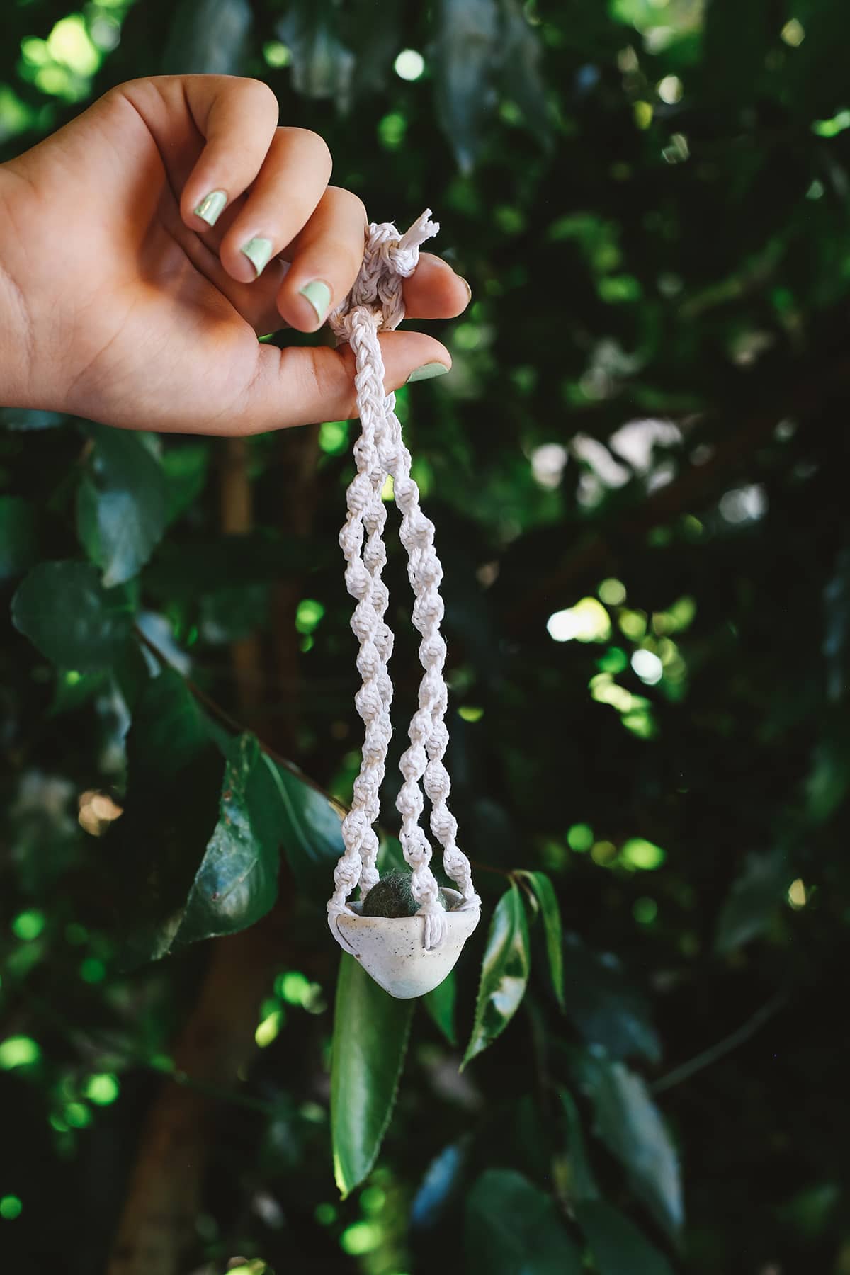 Àine & Co. Handmade Ceramic Car Diffusers in mountain style featuring woven string and essential oil felt ball inside