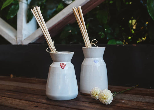 Àine & Co. Love in Bloom Ceramic Reed Diffuser and vase, featuring a painted heart shape.