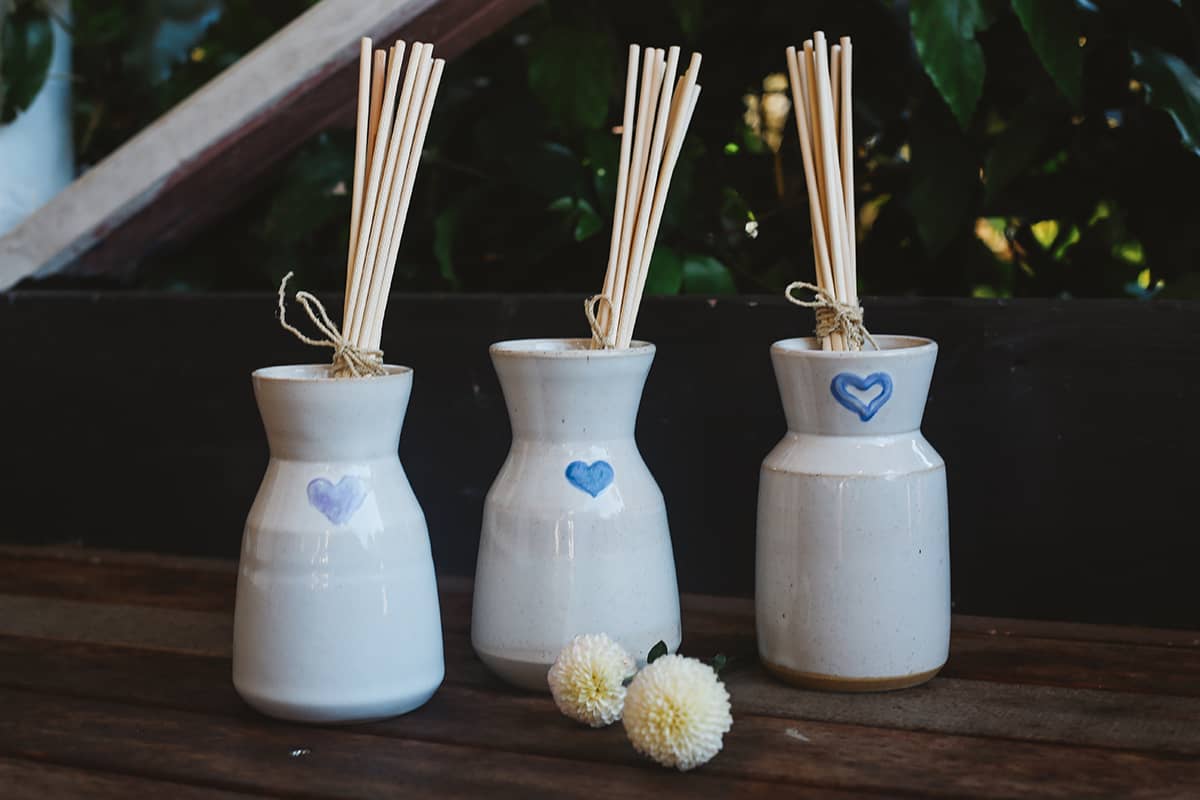 Àine & Co. Love in Bloom Ceramic Reed Diffuser and vase, featuring a painted heart shape.