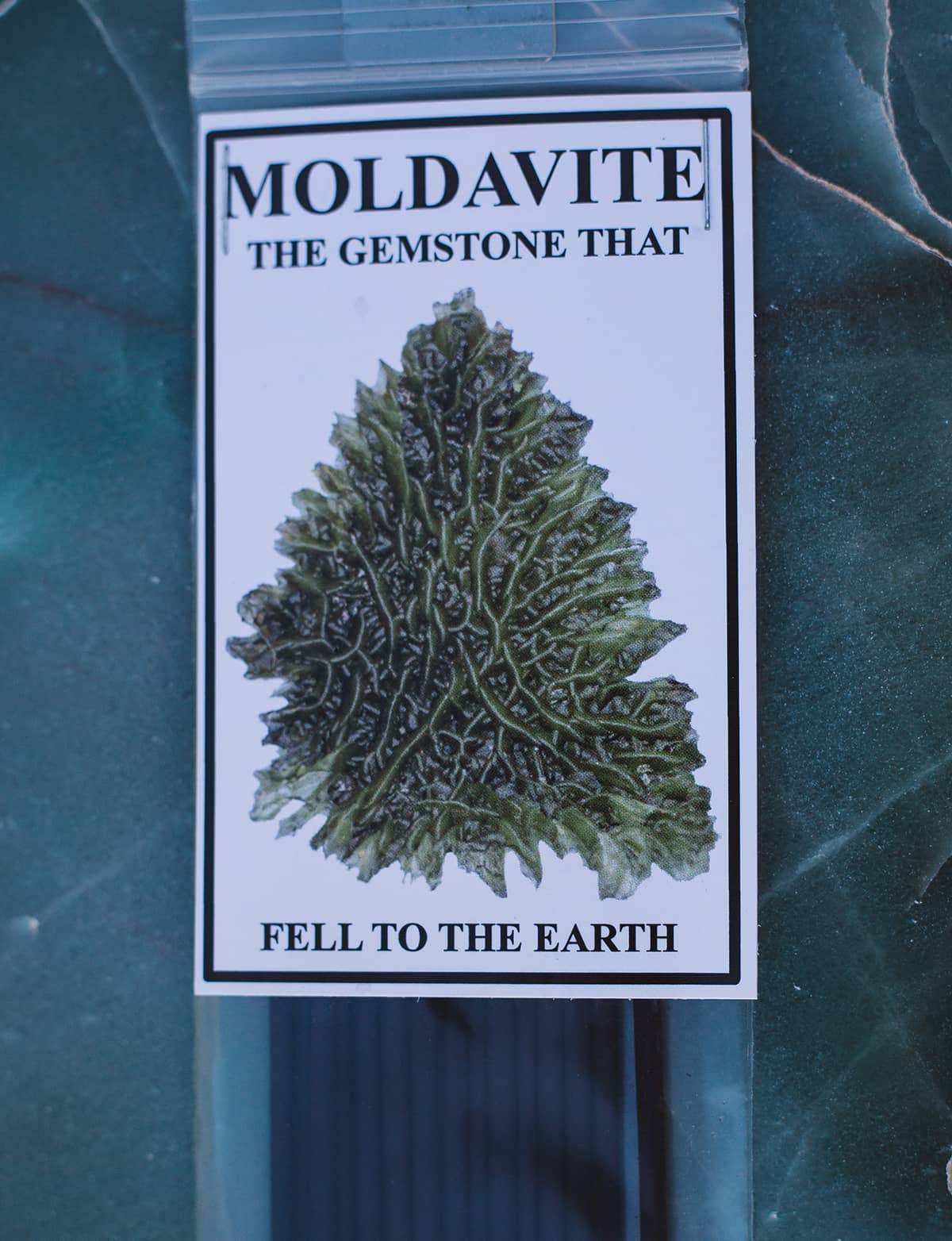 Close-up shot of one pack of 15 Àine & Co. Moldevite Incense Sticks