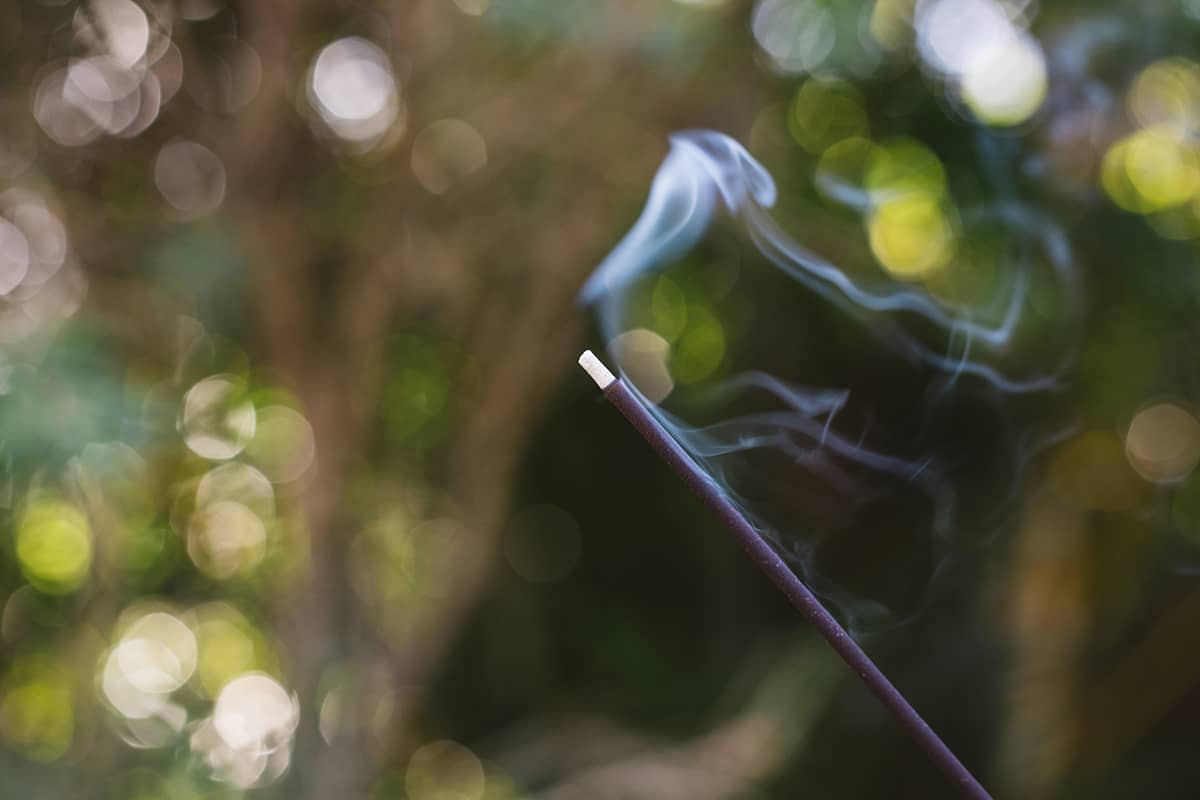 Close-up shot of Àine & Co. Moldevite Incense Stick burning