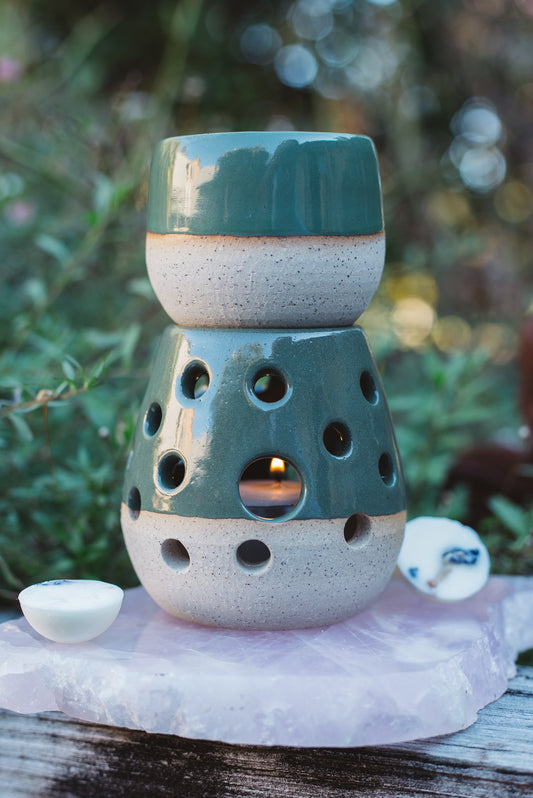 Àine & Co. ceramic tealight and wax melt burner featuring a teal green design